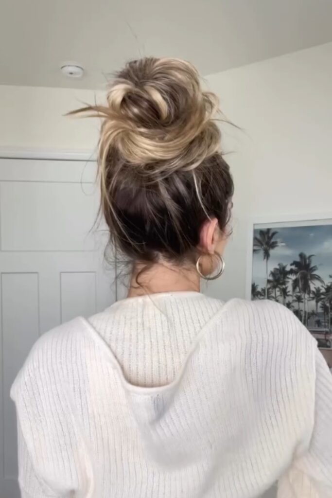 a messy bun is one of the easiest "I have five minutes" hairstyles for school