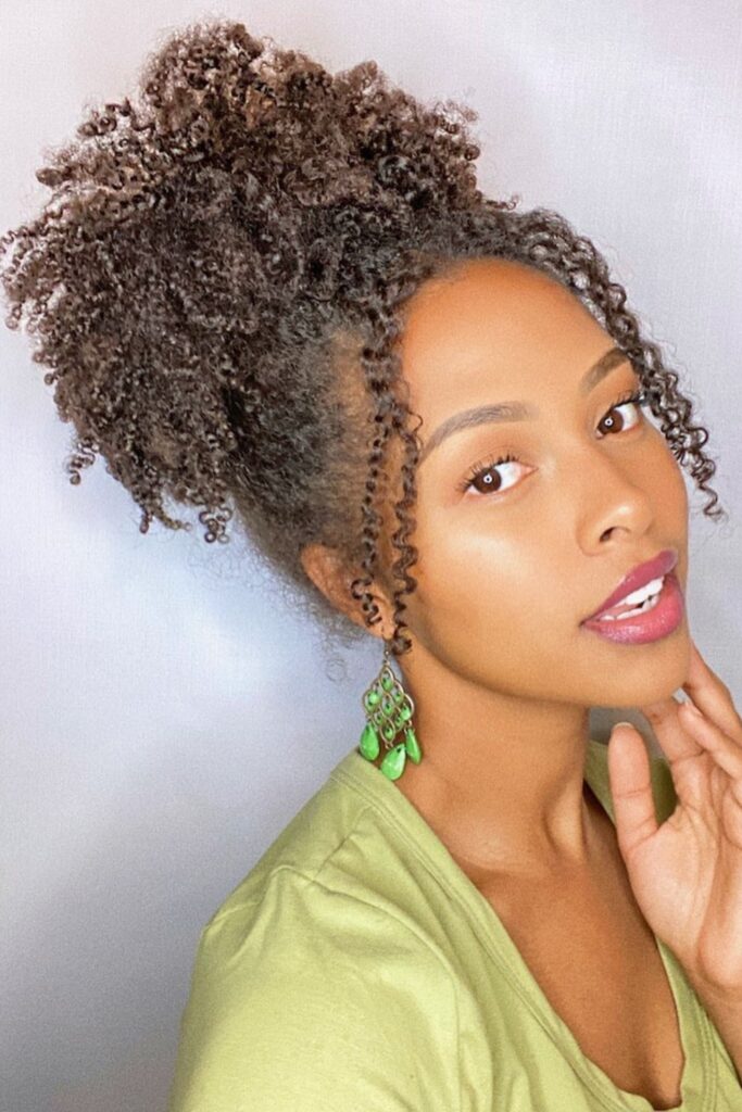 a high puff is one of the most popular back to school hairstyles for natural hair