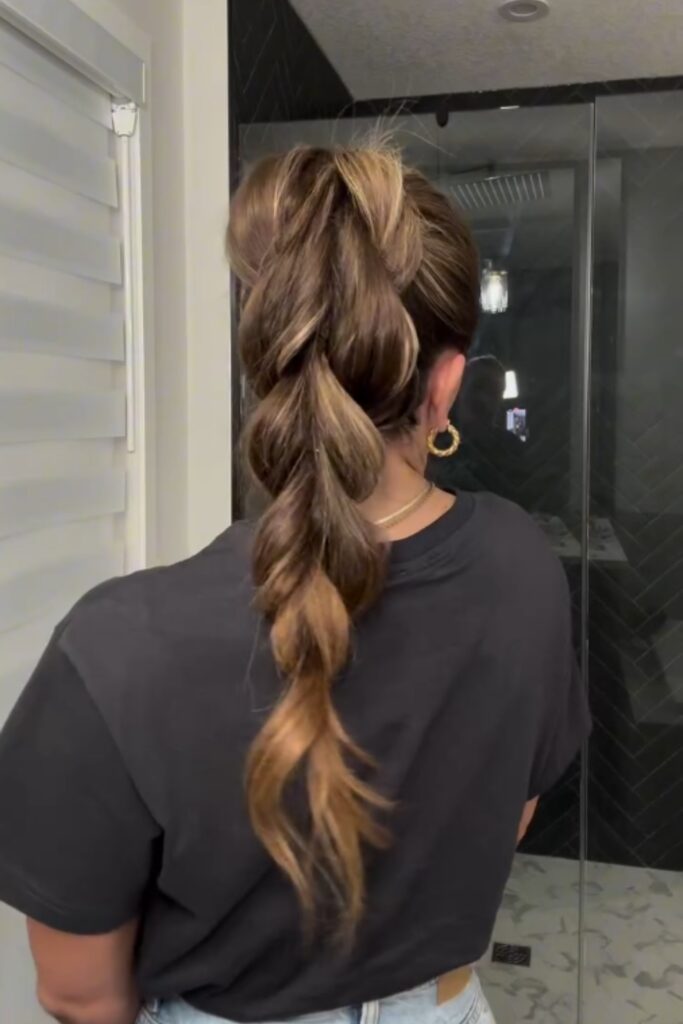 go for a braided ponytail if you want a stylish yet easy back to school hairstyle