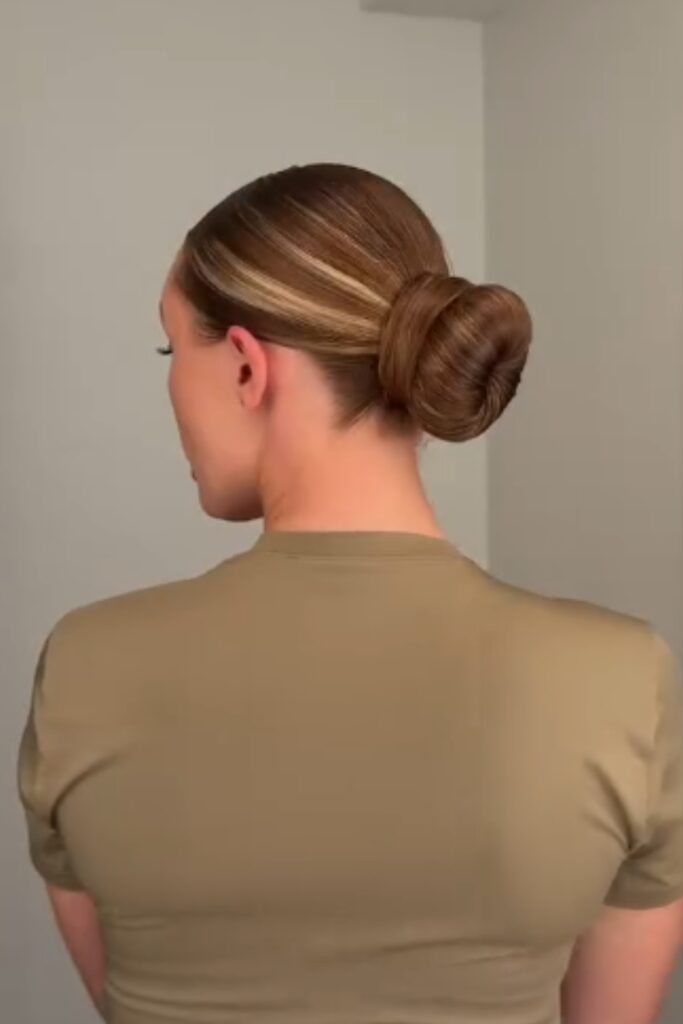 low bun, a perfect back to school hairstyle for a tidy and professional look