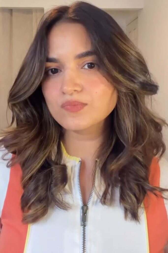 soft curls are of the back to school hairstyles that feel effortless and pretty