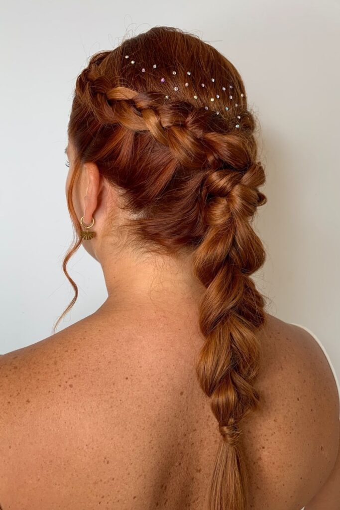 Dutch braid into a bubble braid on red hair with tiny rhinestones