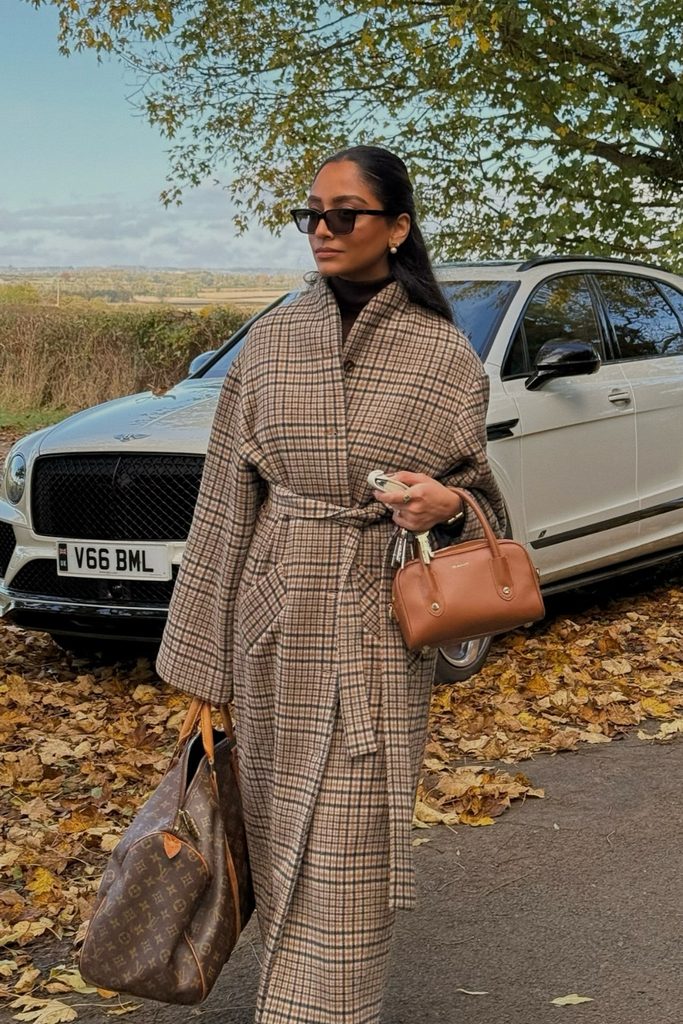 Belted plaid wool coat in brown and rust tones, an autumn outfit statement piece