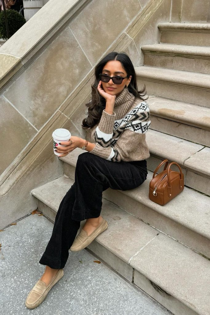 Fair Isle turtleneck sweater with black corduroy pants, a cozy fall outfits idea