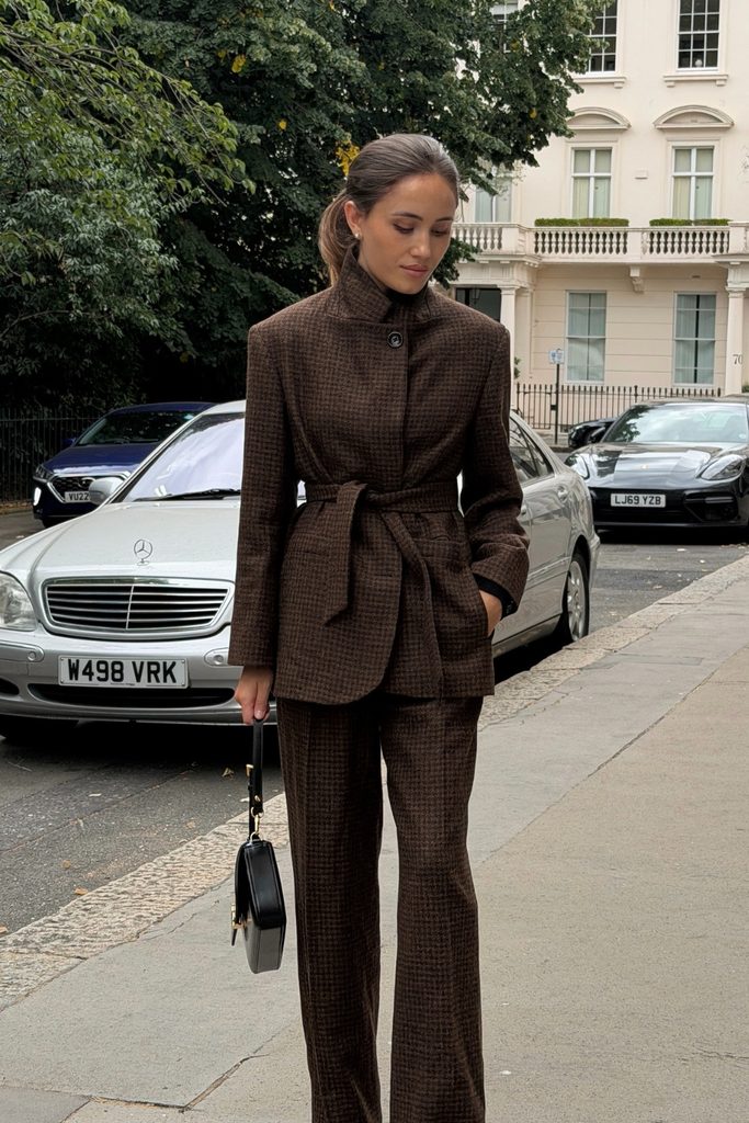 Belted brown houndstooth blazer and trouser set, a chic fall work outfits idea