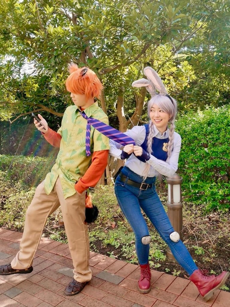 Couple dressed as Nick Wilde and Judy Hopps from Zootopia for Halloween