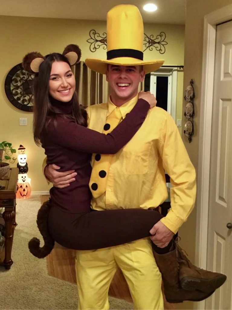 Couple dressed as Curious George and the Man in the Yellow Hat.