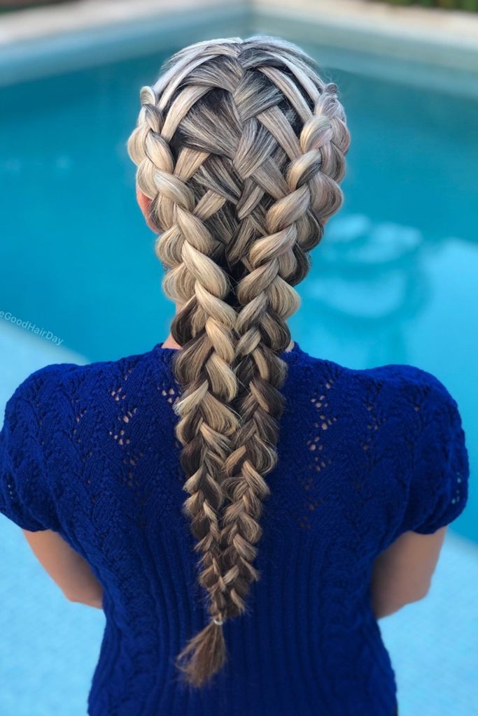 Double waterfall braid and double Dutch braids in a layered woven winter braid style