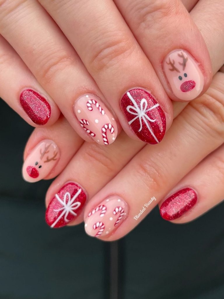 Reindeer Christmas nail art on short round nails