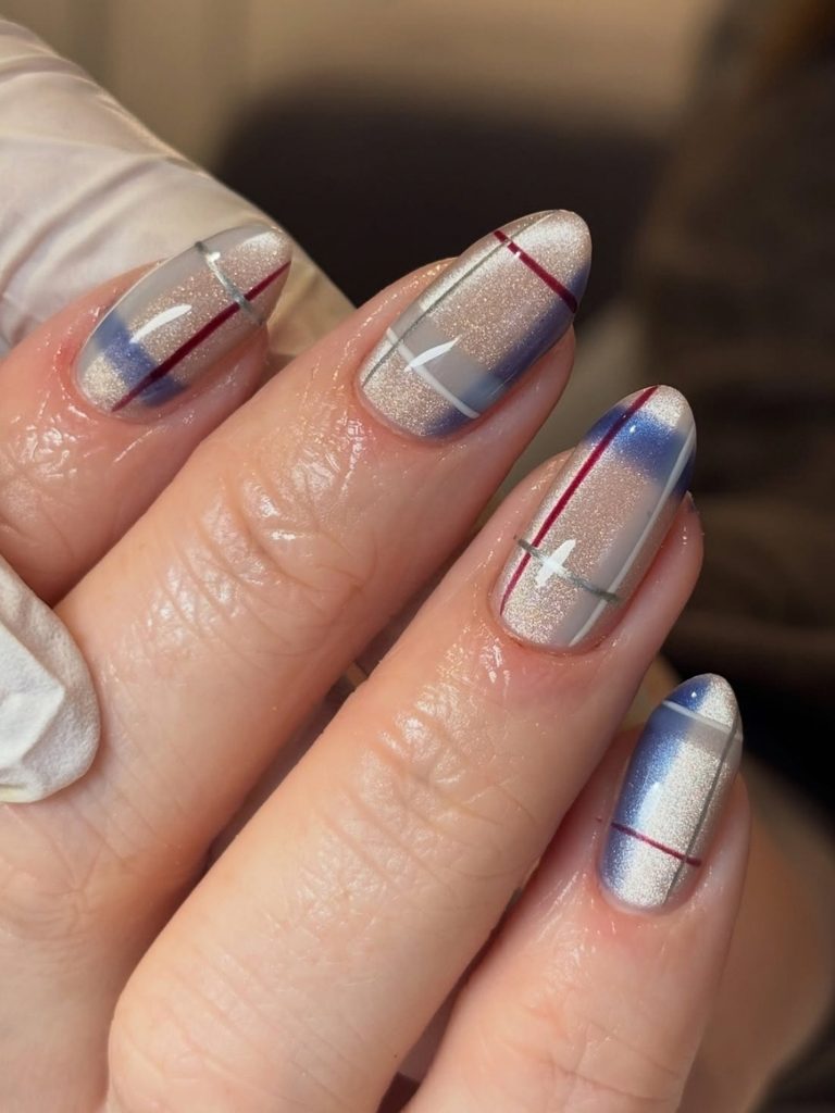 Sheer plaid winter nail art on almond nails