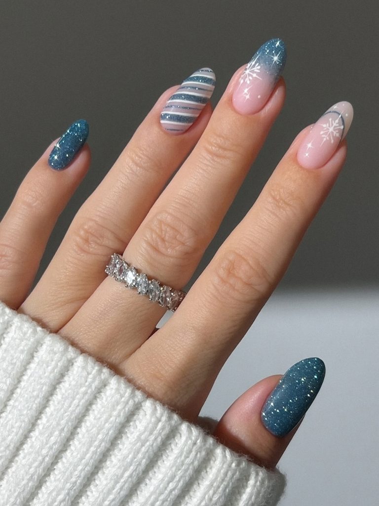 Denim blue winter nail art with a candy stripe accent
