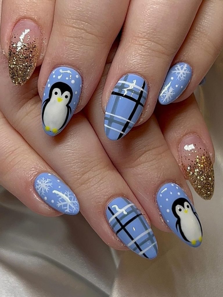 Cute winter nails with penguins and blue plaid