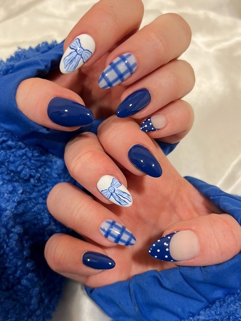 Royal blue plaid nails with white bows