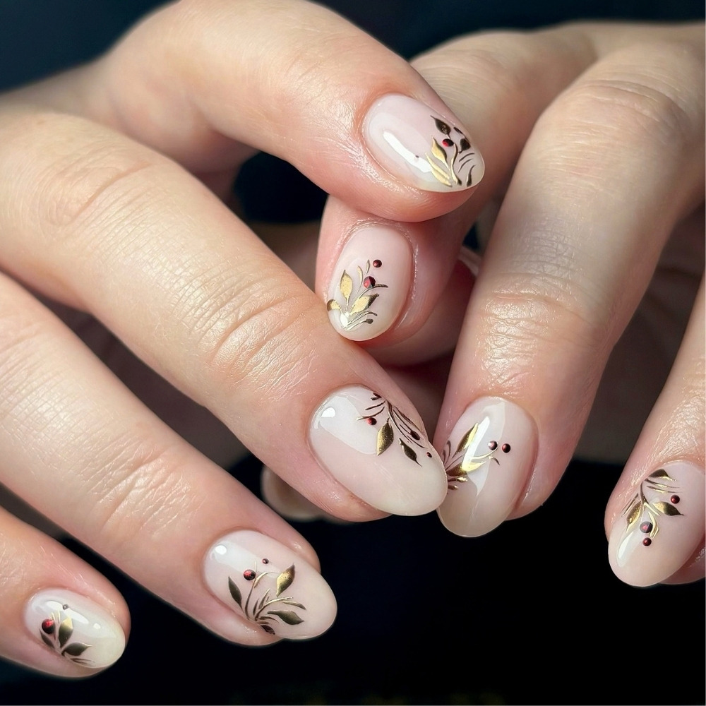 Minimalist winter nails with gold and burgundy sprigs