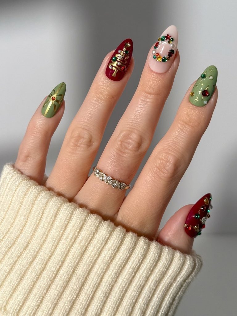 Sage green nails with rhinestone Christmas trees