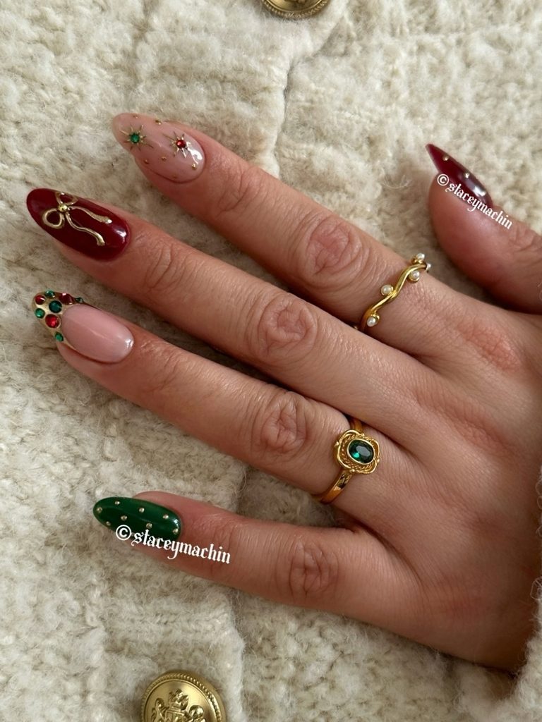 Red and green holly Christmas nails on almond shapes
