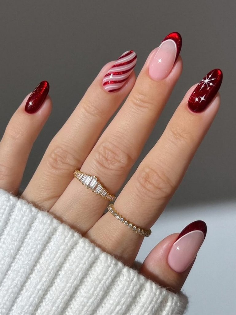Candy cane holiday nails with red French tips